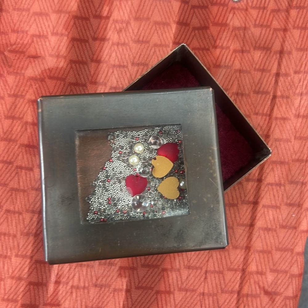 Handmade copper trinket box with unique mobile interior